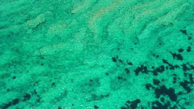 平静清晰的<strong>海</strong>水背景平静<strong>海</strong>水背景空中镜头完美的水晶清晰的蓝色的绿松石水前视图水晶清晰的蓝色的水表面